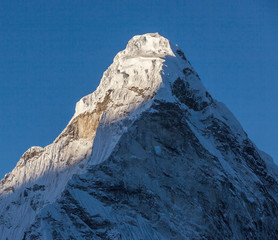 View of the top of the Ama Dablam (6814 m) from the valley of the Chhukhung in morning - Nepal,...