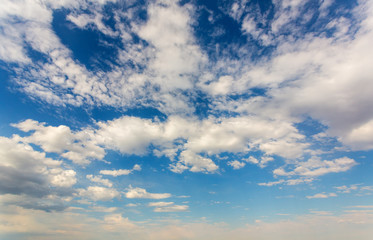 Cloudscape on deep blue sky.