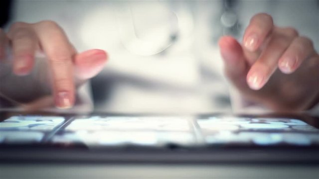 Doctor Examines An X-ray Of Patient On Digital Tablet