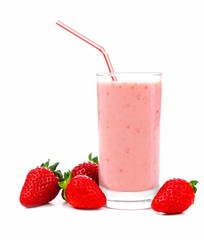 Pink strawberry smoothie in glass with scattered berries isolated on white