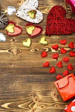 present package and heart on wood as valentines decoration