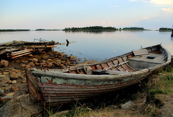 Old fishing boat, the monks of the Solovetsky monastery on the shore of the island of the Solovetsky archipelago in the White Sea in Arkhangelsk region, Russian Federation