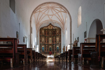 Interior of the Monastery of San Bernardine of Siena, founded by the Franciscan order in the 16th century in Valladolid, Mexico. - obrazy, fototapety, plakaty