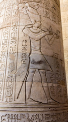 Egyptian ancient temple engravings on the wall