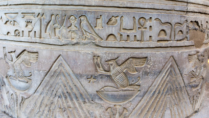 Egyptian ancient temple engravings on the wall
