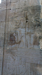 Egyptian ancient temple engravings on the wall