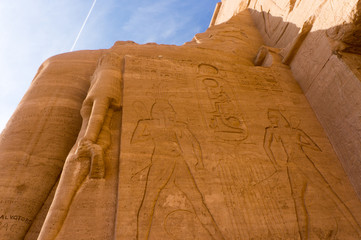 Fototapeta na wymiar Egyptian ancient temple engravings on the wall