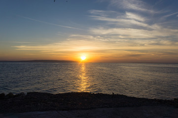 Fototapeta na wymiar Watching sunrise on the Red Sea coast in Egypt