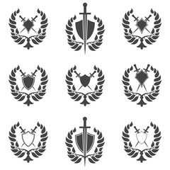 Fototapeta premium Set of abstract shield and sword icon