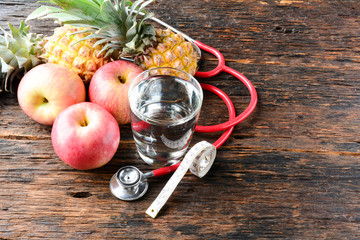 Fruit, heart, stethoscope and water glass for healthy and body slim 