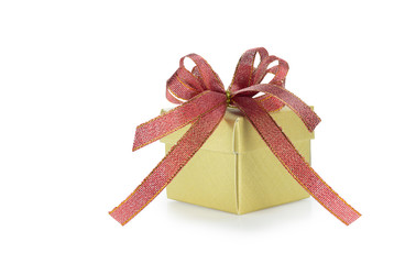 Gold gift box with red ribbon