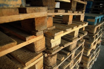 .wooden pallets. wood texture. Pallets stacked in piles.