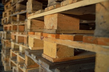 .wooden pallets. wood texture. Pallets stacked in piles.