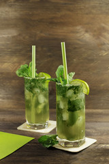 Mojito cocktails with mint leaves and lime