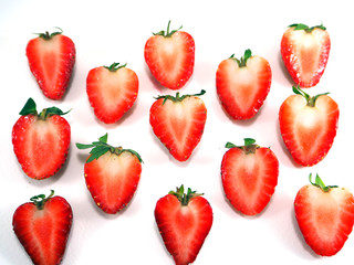 Strawberry sliced pattern on white background