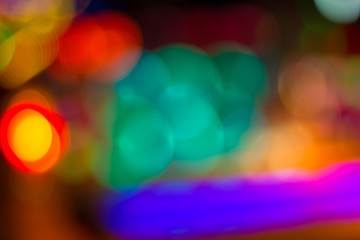 Blurred image of colorful festive lights that can be used as bac