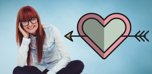 Composite image of portrait of smiling woman sitting