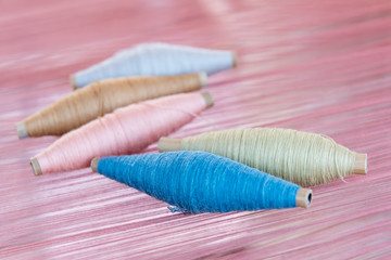 reels of pastel thread