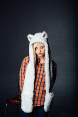 beautiful sexy girl wearing white fur hat