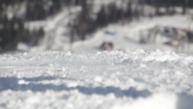 Skiers ride on the slope in ski resort