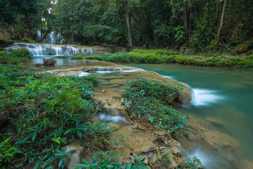 Tharn Sawan waterfall or Bor Beer waterfall is located in Doi Phu Narng national park, Chiang Muan district of Payao province, Thailand. 