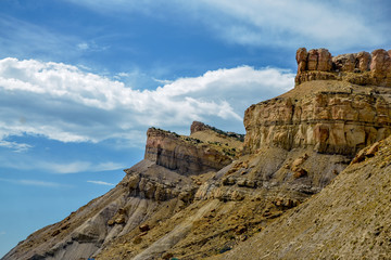 Fototapeta na wymiar sandstone cliffs with mudstone outcrops on Mountain Garfield Grand Junction, Mesa, County, Colorado, USA