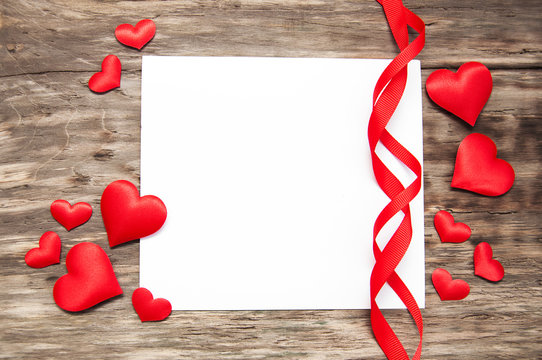 Greeting card with red hearts