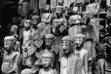 The carved wooden puppets  black and white