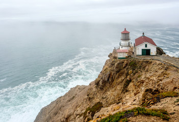 Fototapeta na wymiar Point Reyes Lighthouse at Pacific coast, built in 1870