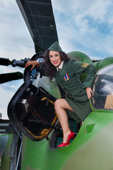 Old-timer helicopter and sexy girl