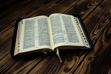 Bible on wooden board