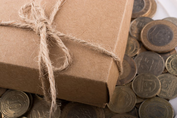 Turkish Lira coins by the side of gift box