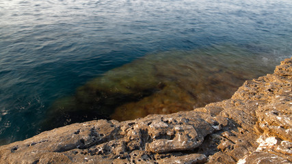 Aegean shore in Greece, Thassos island - waves and rocks - long exposure photography
