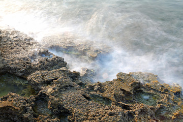 Aegean shore in Greece, Thassos island - waves and rocks - long exposure photography
