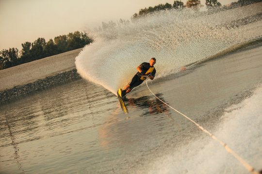 Man Water Skiing On Lake