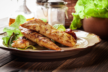 Grilled chicken breasts served with grilled paprika