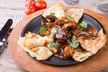 Pancakes with mushrooms