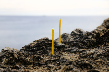  candle on the rock