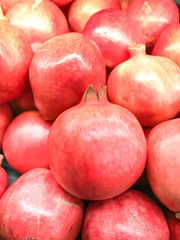Closed up pile of Pomegranates in the market
