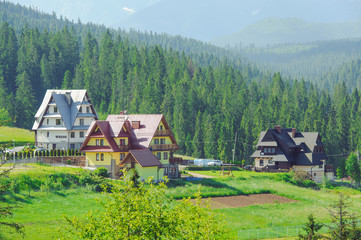 Guest house in the traditional mountain style and mountain landscape.