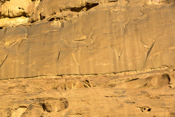 Rock carvings on rocks in the desert of Wadi Rum 
