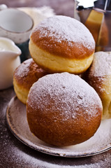Traditional donuts with powdered sugar
