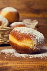 Traditional donuts with powdered sugar