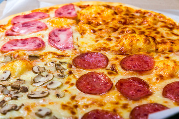 Four taste pizza with pepperoni cheese mushrooms and becon useful for background