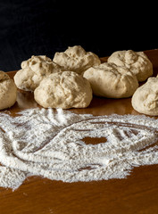 Pieces of ready pizzas dough