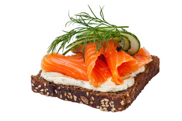 Salmon fillet sandwitch with cream cheese, cucumber, dill and pepper, isolated on white background.