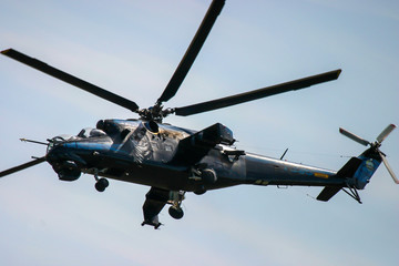 Fototapeta na wymiar Attack helicopter in flight 