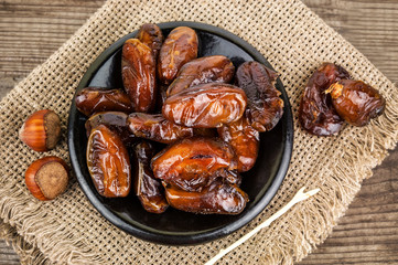 sweet dates on black plate