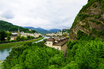 Fototapeta na wymiar Salzach River in Salzburg, Austria. Famous place Unesco Heritage Festung Hohensalzburg, Salzburger Land, Austria, Europe