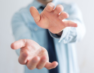 Businessman showing his empty hand